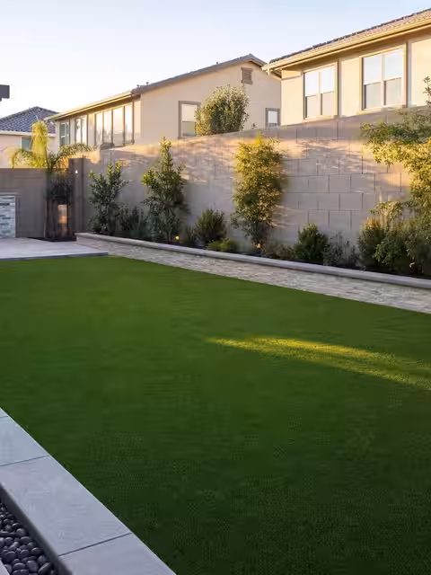 Pristine artificial turf lawn in a Tulsa backyard